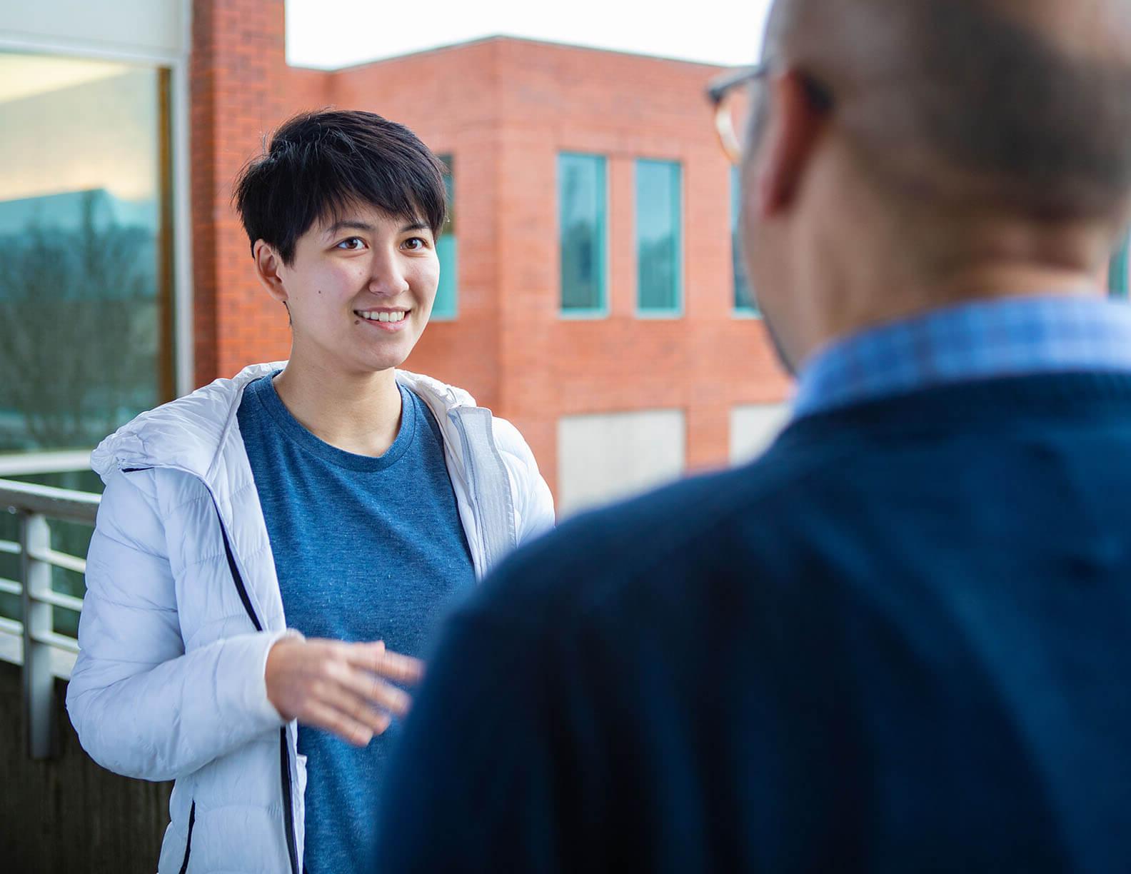 An SPU student meets with a mentor | Photo by Lynn Anselmi